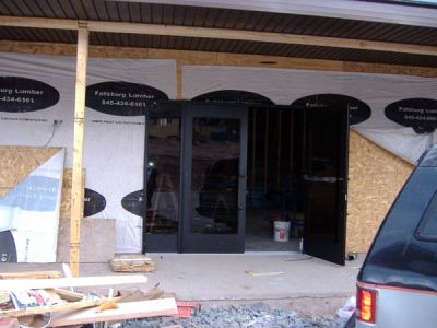 5/1/07 - Main Building
The Main Lobby doors are being installed.

