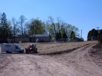 5/13/07 - Main Building
The grass (hay) being watered.
